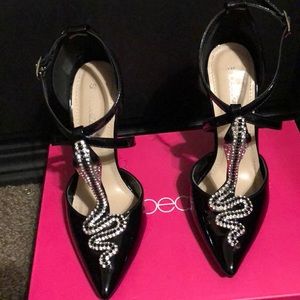 Black snake pumps